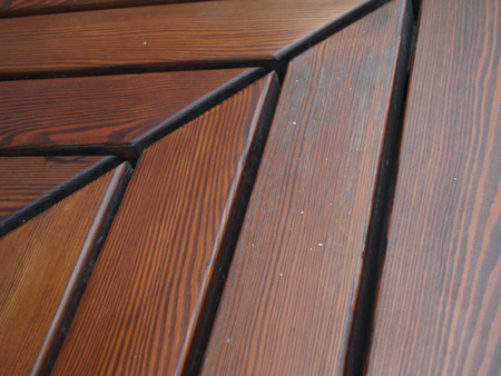 Wooden bench shooted from the narrow angleの写真素材