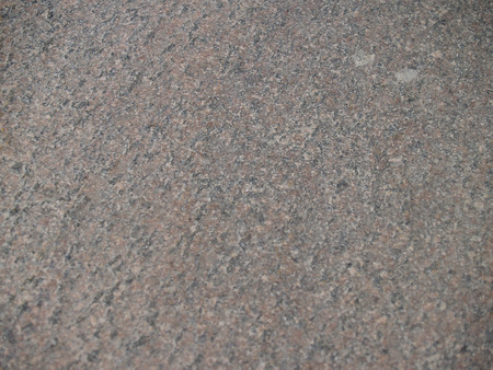 Closeup of a surface of textured stoneの写真素材