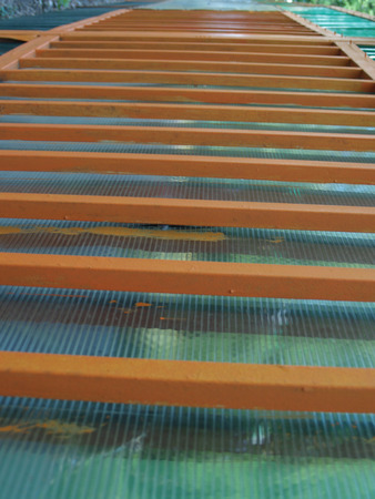 Green and orange fence  patternの写真素材