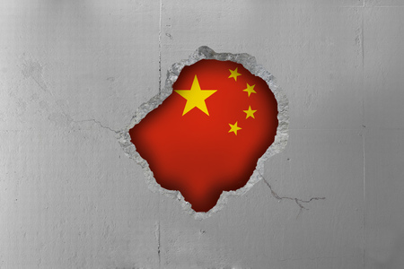 China flag behind a concrete wall.の写真素材