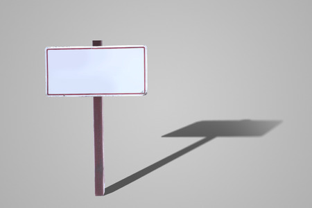 Blank signs with shadow on grey background.の写真素材