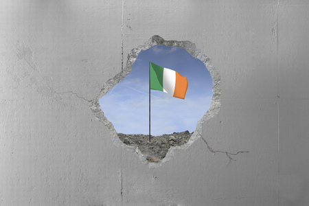 Ireland flag behind a concrete wall.の写真素材