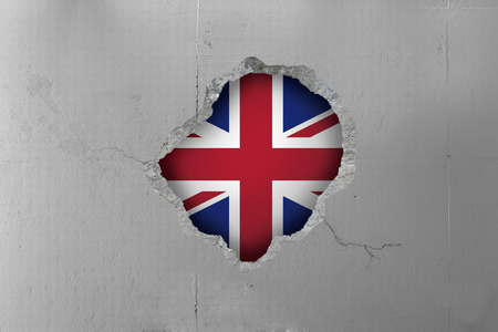 United Kingdom flag behind a concrete wall.の写真素材