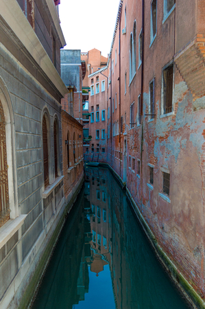 Venice is a city in northeastern Italy sited on a group of 118 small islands separated by canals and linked by bridges. の写真素材