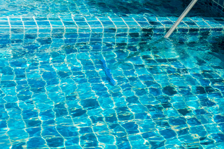 Cleaning the swimming pool