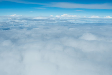 Blue sky and cloud view from airplaneの写真素材