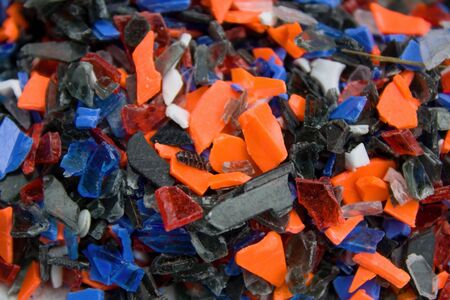 Crushed colorful recycled plastic. Plastic for further processing.Recycle! Cleaning up nature is...