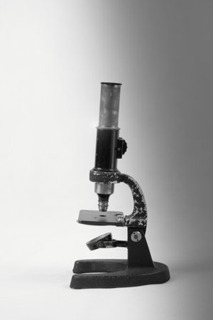 Old microscope for inspection and analysis of defects. Microscope, is an optical device for...