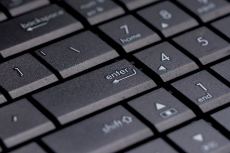 Laptop keyboard with enter in the center