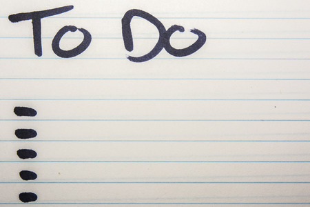 To do list written on piece of paperの写真素材