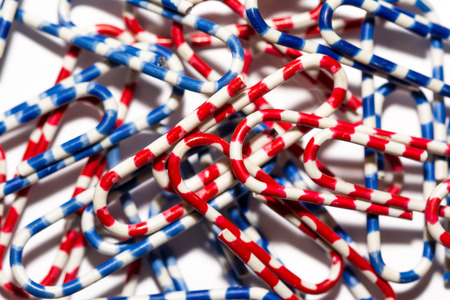 Colorful paperclips stacked
