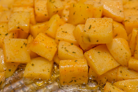 Spicy tomatoes in baking panの写真素材