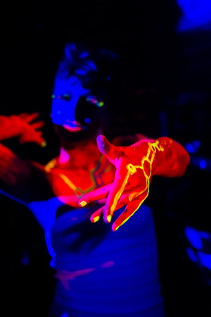 Female dancer with fluorescent makeup