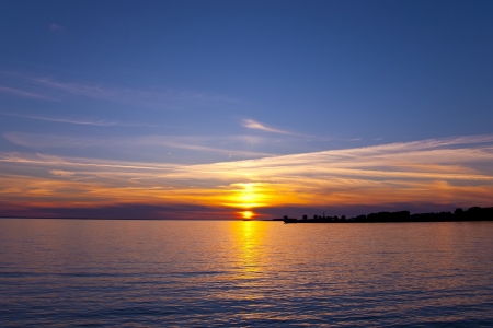Beautiful summer sunset over the seaの写真素材