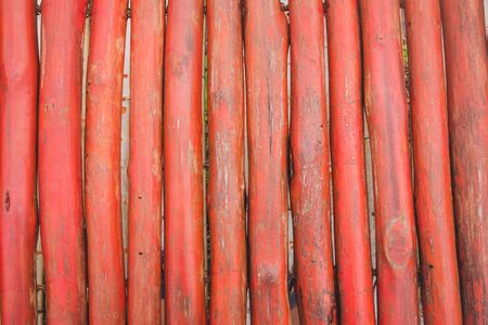 Close up of red wooden background texture, free space for design text or pictures.の写真素材