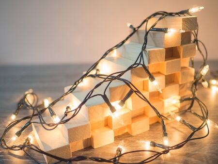 Wooden block tower with Party lights, Funly Planning Alternative Risk management and Strategy in Business concept.の写真素材