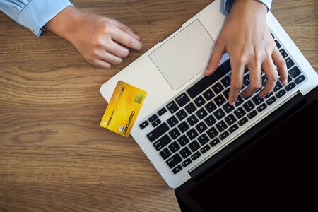Business woman consumer spending via credit card and internet banking for shopping online.の写真素材