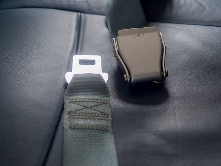 Safety seat belts on airplane chairs, Transportation and vehicle concept.