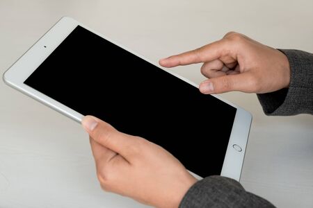 Business woman use  tablet set targets for new business management success.