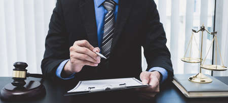 Picture of the male lawyer is providing service to consult business dispute.
