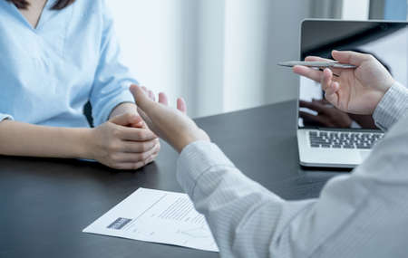 Business office executives are interviewing job applicants in the meeting room.の写真素材