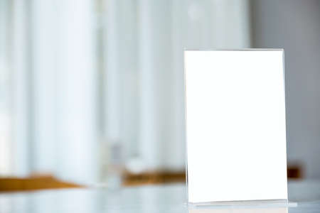 Mockup menu stand sign frame display on the restaurant bar table.の写真素材
