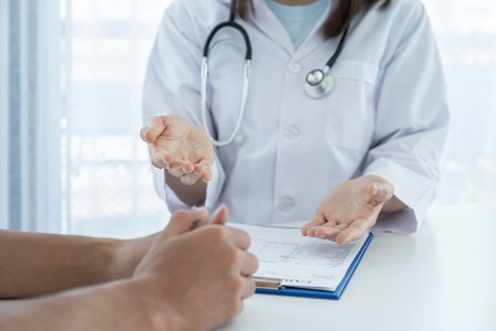 Doctors report health examination results and recommend medication to patients.の写真素材