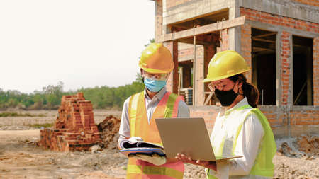 Engineer contractor team meeting work safety plan industry project and check design at the...