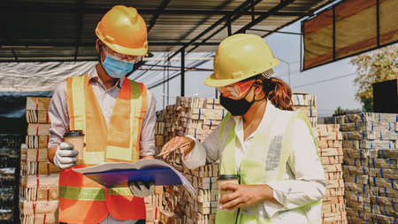 Engineer contractor team meeting work safety plan industry project and check design at the...