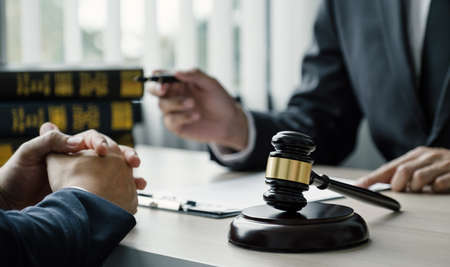 gavel hammer, Lawyer providing legal consult business dispute service to the man at the office.の写真素材