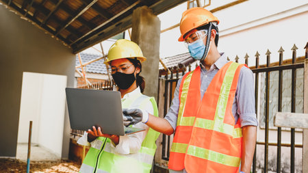 Engineer contractor team meeting work safety plan industry project and check design at the...