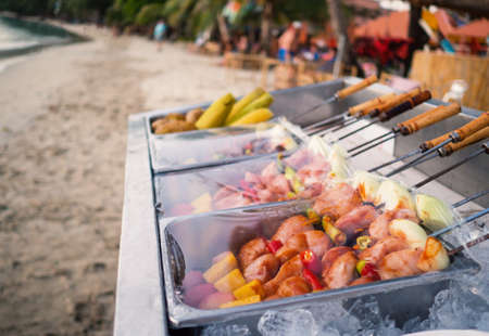 Barbecue prepared for a summer beach party.の写真素材