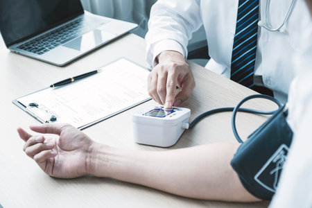 The man doctor hand use the pulse meter to measure the pressure of the patient, medical checkup...
