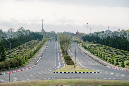 An empty dual-lens road with no cars at the end of the road.の写真素材