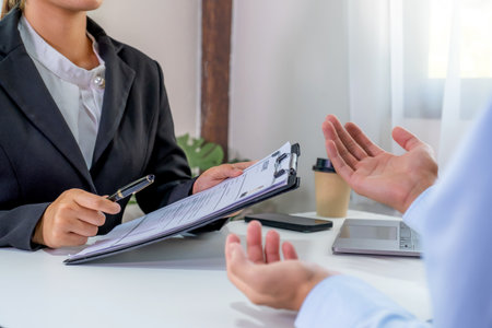Office executives interviewing job applicants in the meeting room. employer conversation summary work employment.の写真素材