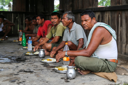 people eating with hands in  chitwan,Nepalのeditorial素材