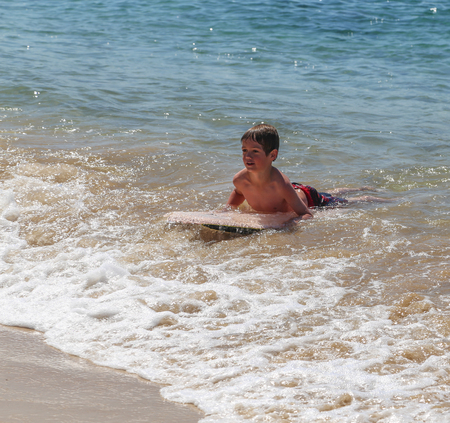 boy in the board ,port stephens,australia,のeditorial素材