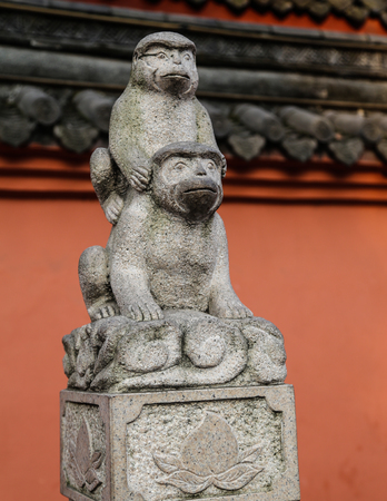 the stone carving of monkey in chengdu,chinaの写真素材