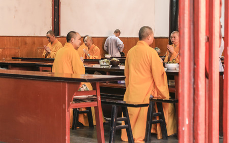 monks dining in wensu temple,chengdu,chinaのeditorial素材