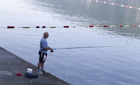 the old man fishing in the bay of kotorのeditorial素材