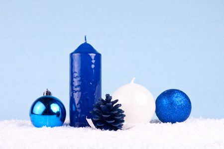 xmas card - candles, xmas balls and oak ball on snowの写真素材