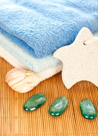 Towels, foot stone, decorative stones and shell - studio shootの写真素材