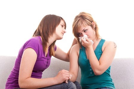 Portrait Of A Girl Comforting Her Sad Friend Royalty Free Images