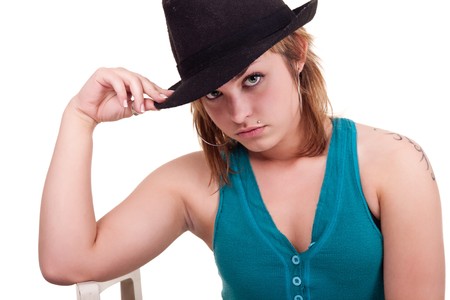 sexy blond girl posing with black hat on white