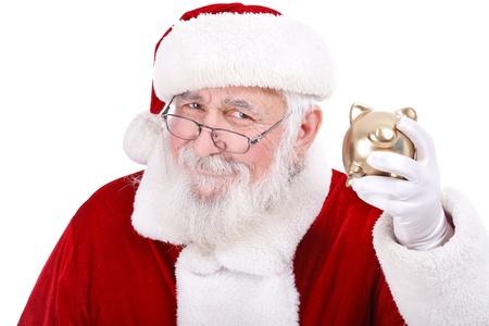 authentic Santa Claus holding gold piggy bank, Christmas budgetの写真素材