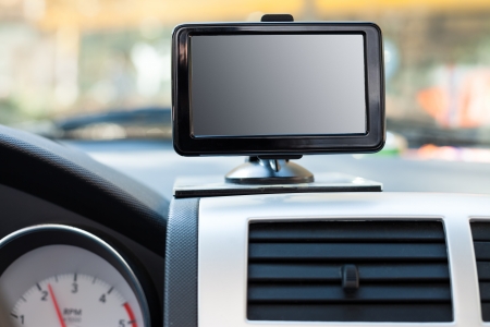 Satellite navigation system on  windshield in car 