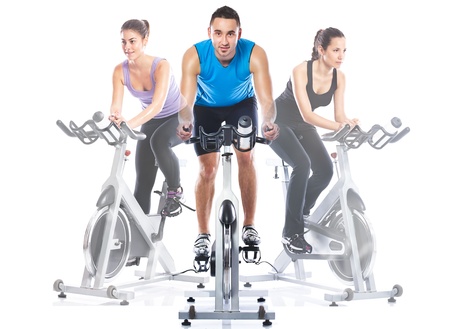 Spinning training riding on  exercise bikes