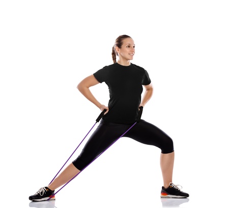 pilates woman doing exercise with resistance rubber