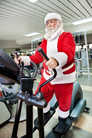 
Santa Claus  doing exercises before delivering presentsの写真素材