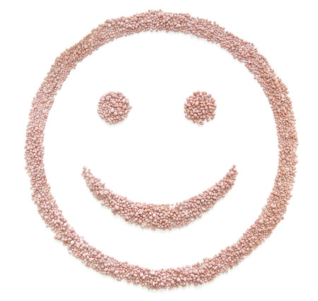 fertilizer	seed in smile shape isolated on whiteの写真素材